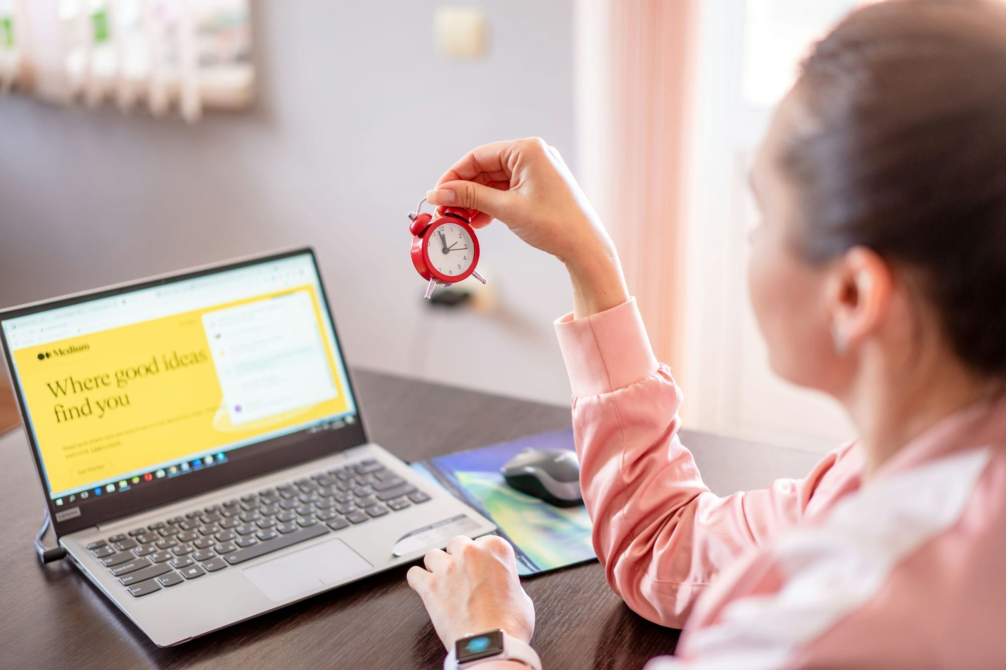 Woman holding clock - AI Employee Scheduling