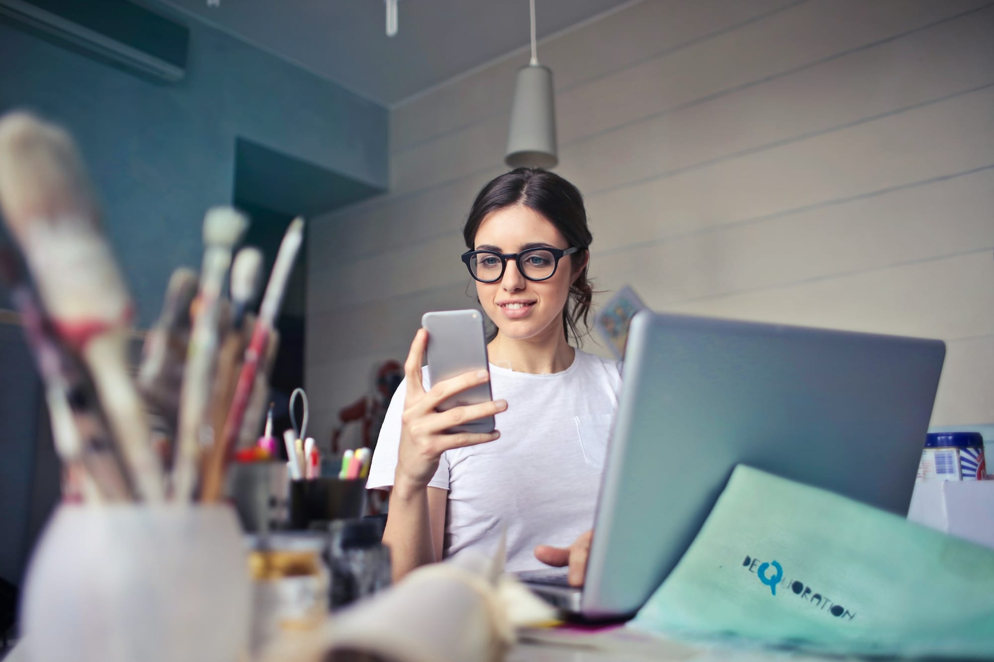 woman on a phone - Best Time Blocking Apps