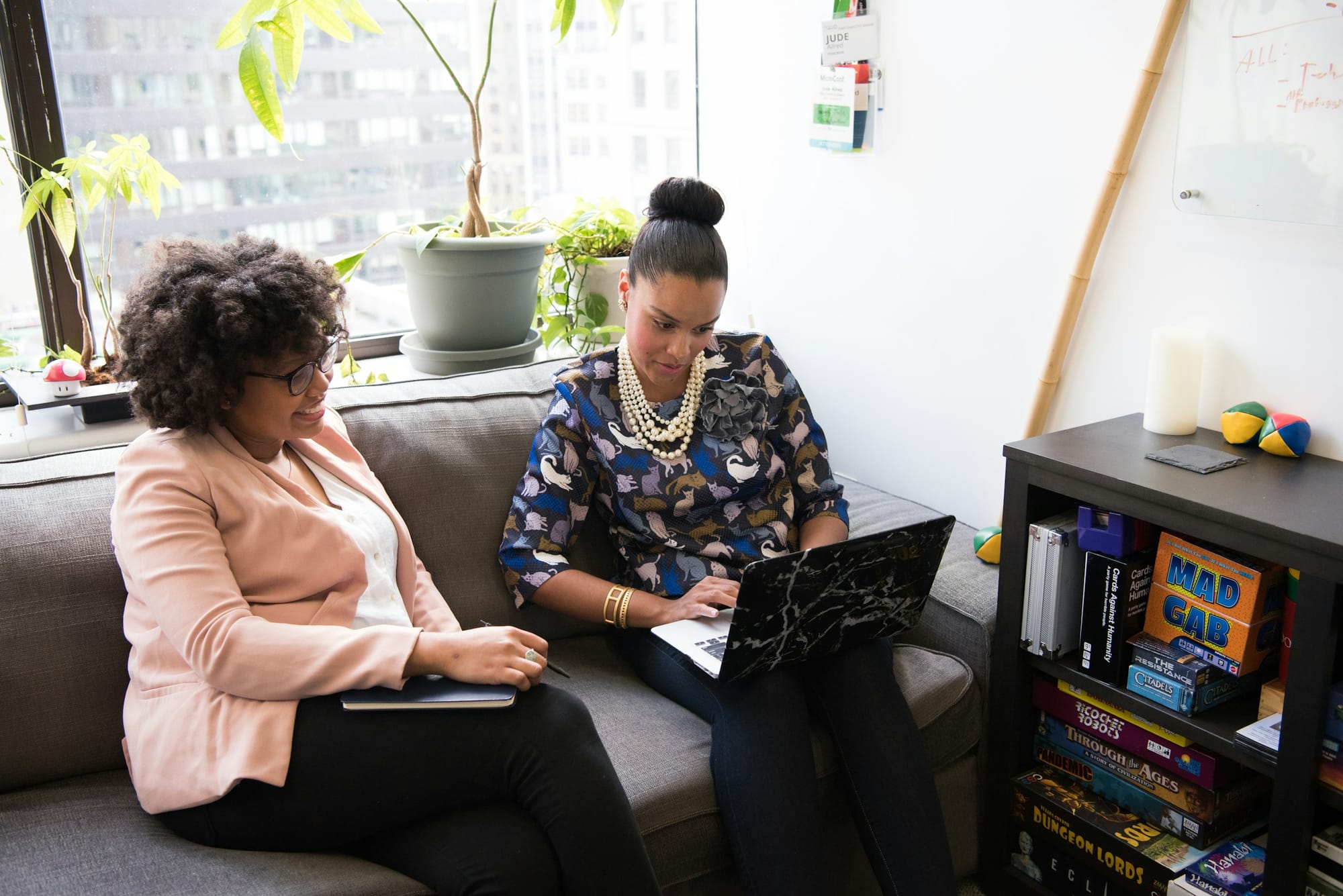 women on a laptop - AI Appointment Setters