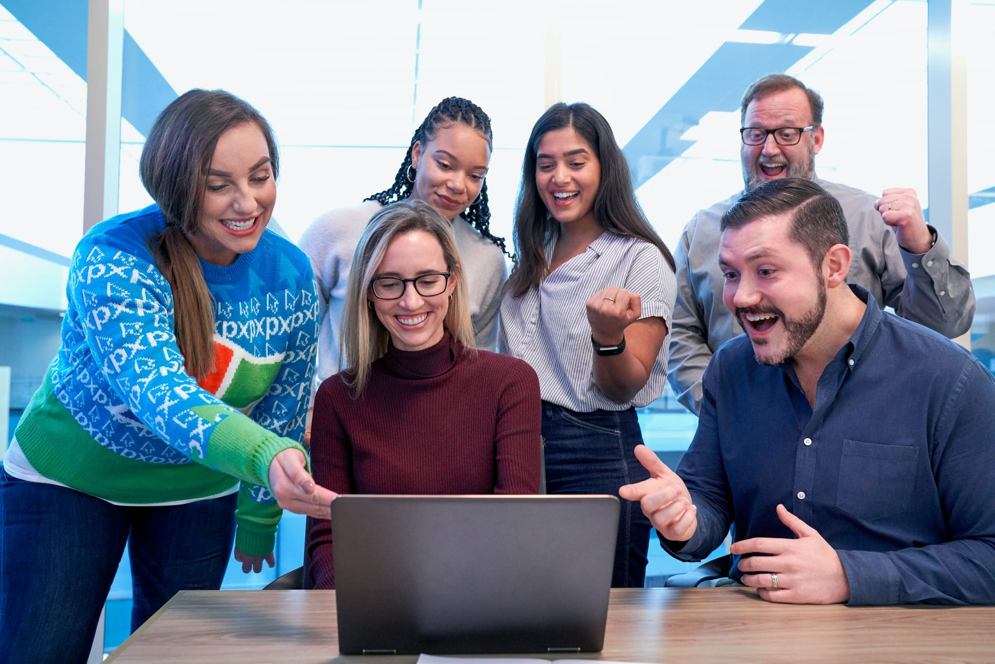 employees looking happy - AI Scheduling