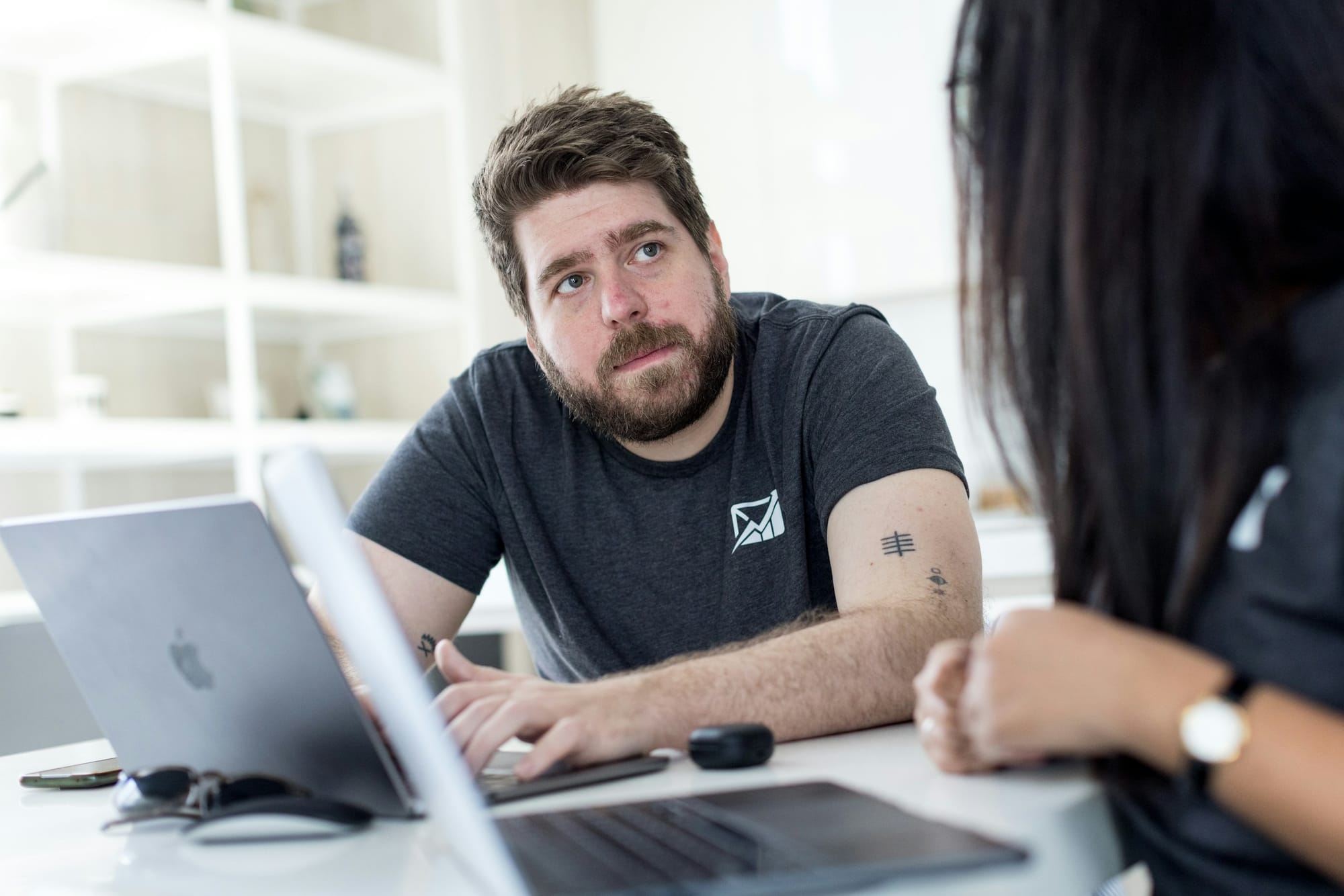 man working with an employee - Organizing Calendar