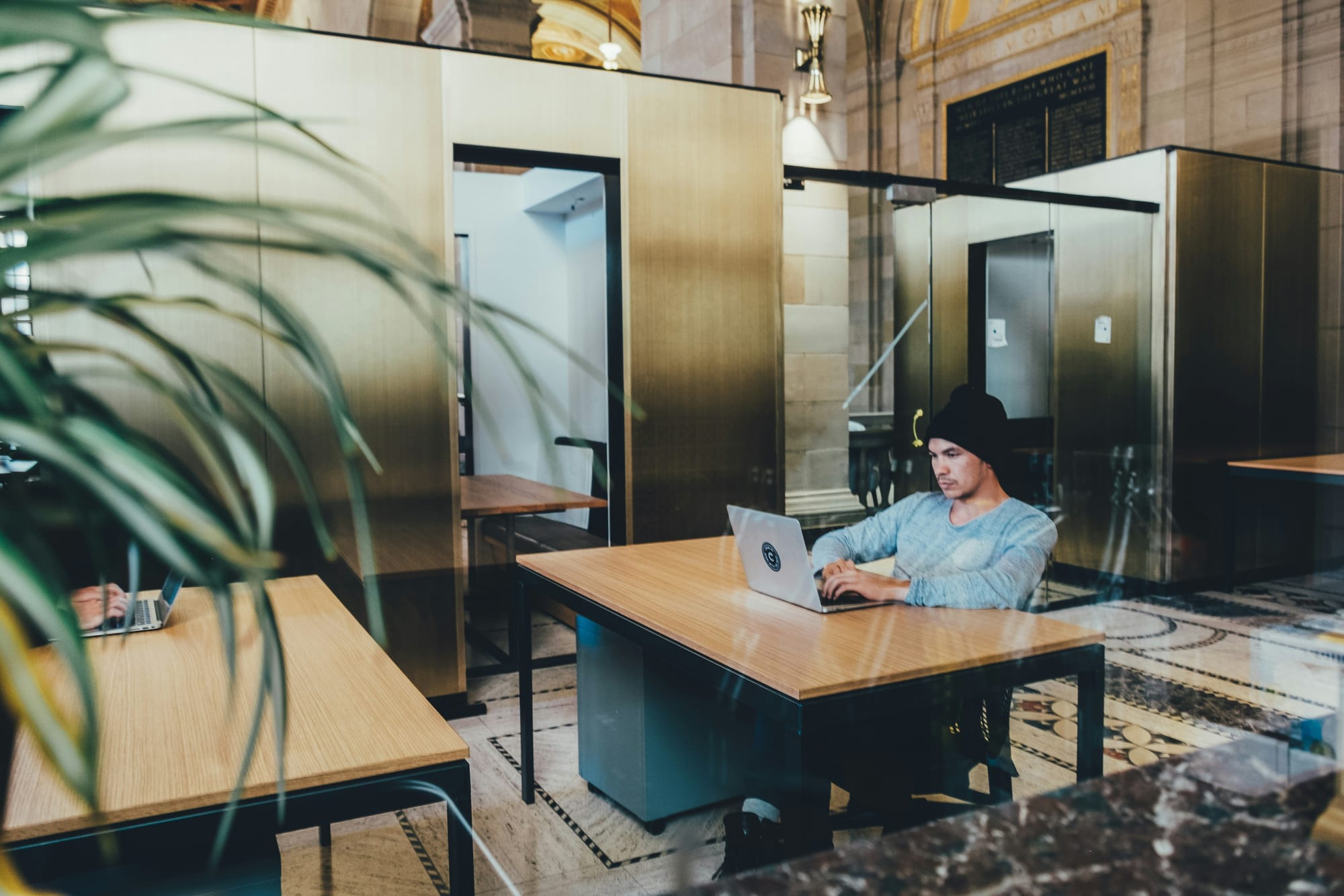 man working on laptop -  Todoist vs Reminders