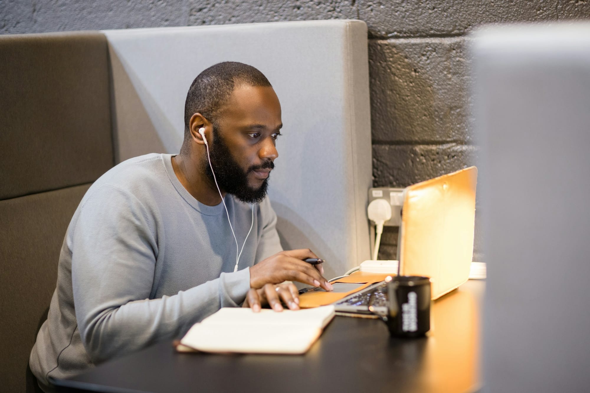 man using headphones - How to Edit Body in Video