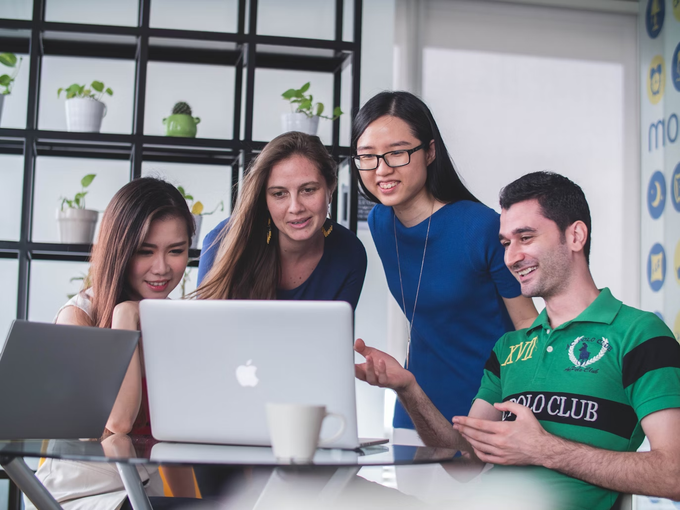 employees smiling - AI Tools for Business Analyst