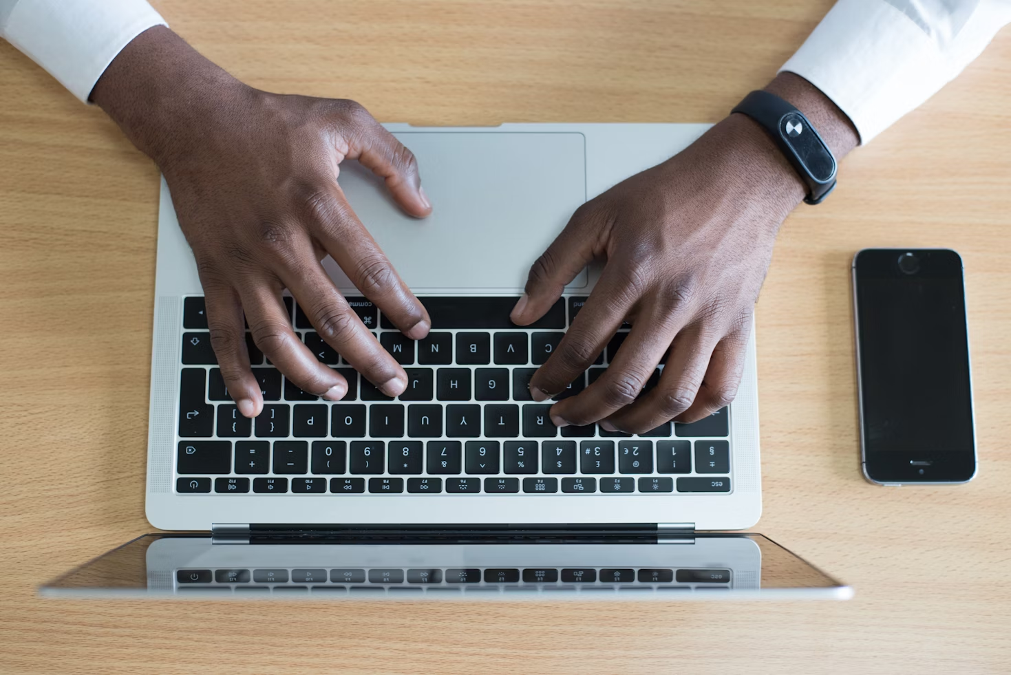 man typing - Focused Note Taking