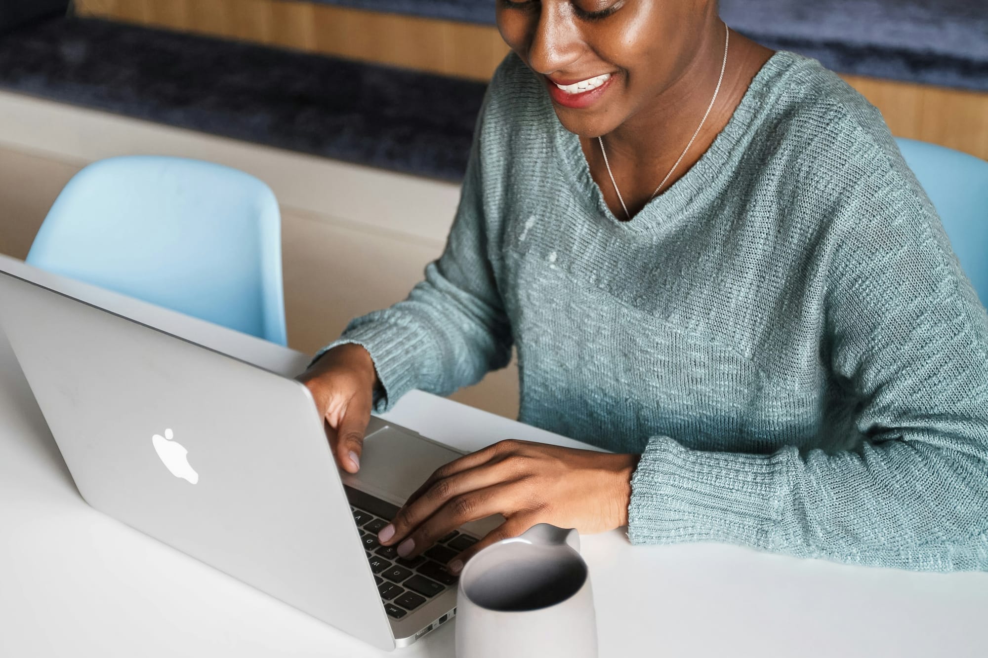 woman smiling - Focused Note Taking