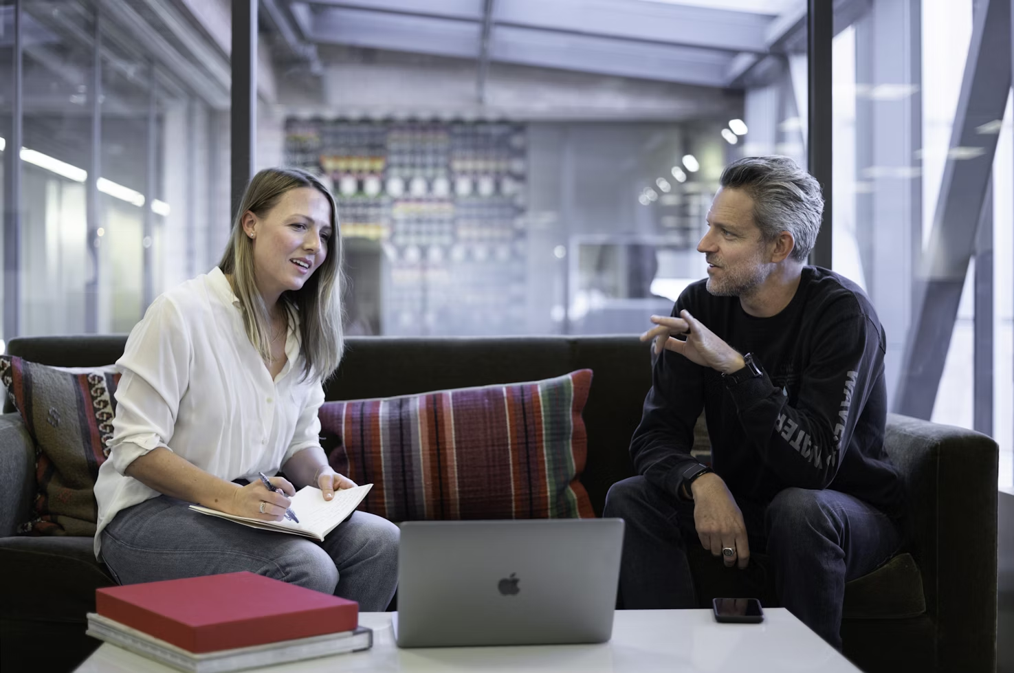 employees talking - How to Prepare Minutes of Meeting