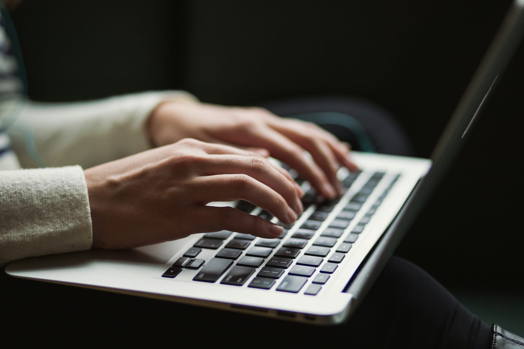 Person Using Laptop - Best AI Note Taker