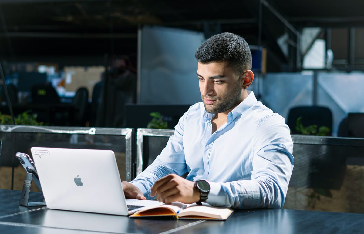 man on a laptop - AI Appointment Setters