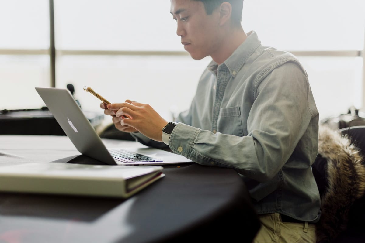 man on a laptop - Best Time Blocking Apps