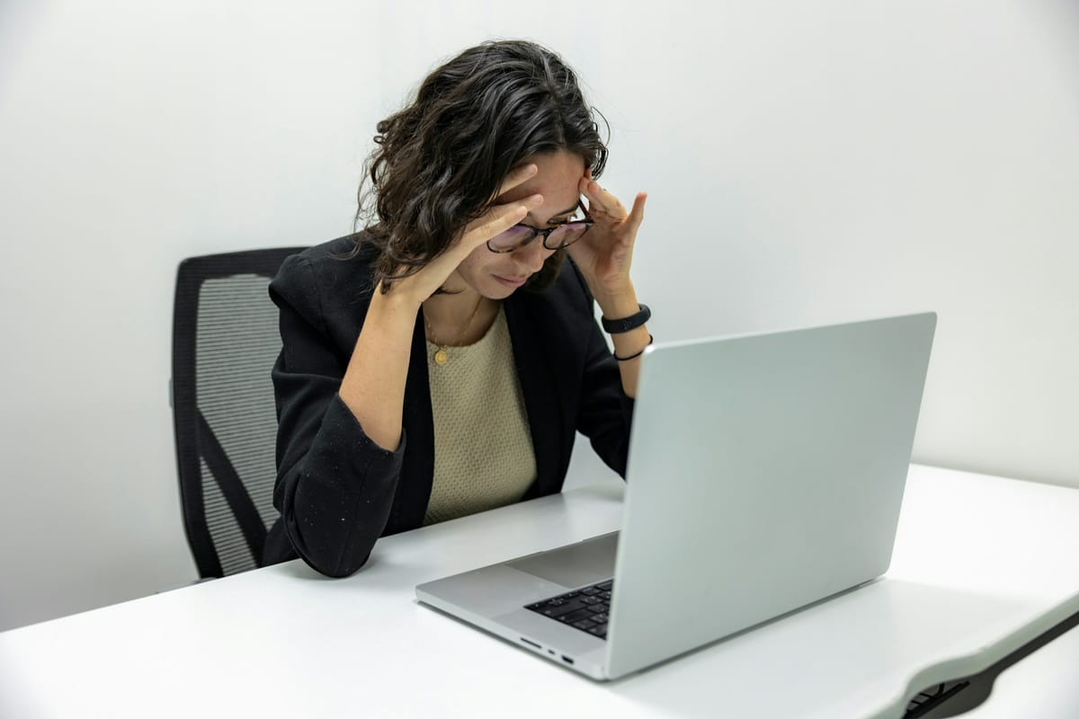 woman on a laptop - Meeting Fatigue