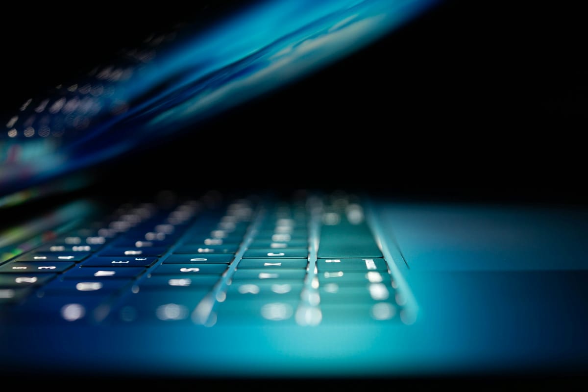 Laptop Laying - AI Tools For Finance